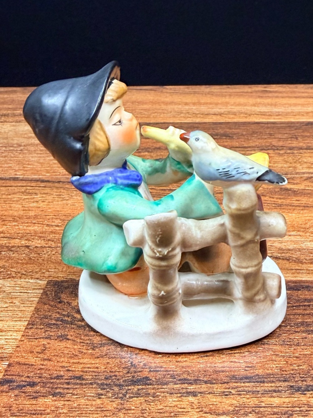 Figurine of Boy Playing Horn - Picture 4 of 15